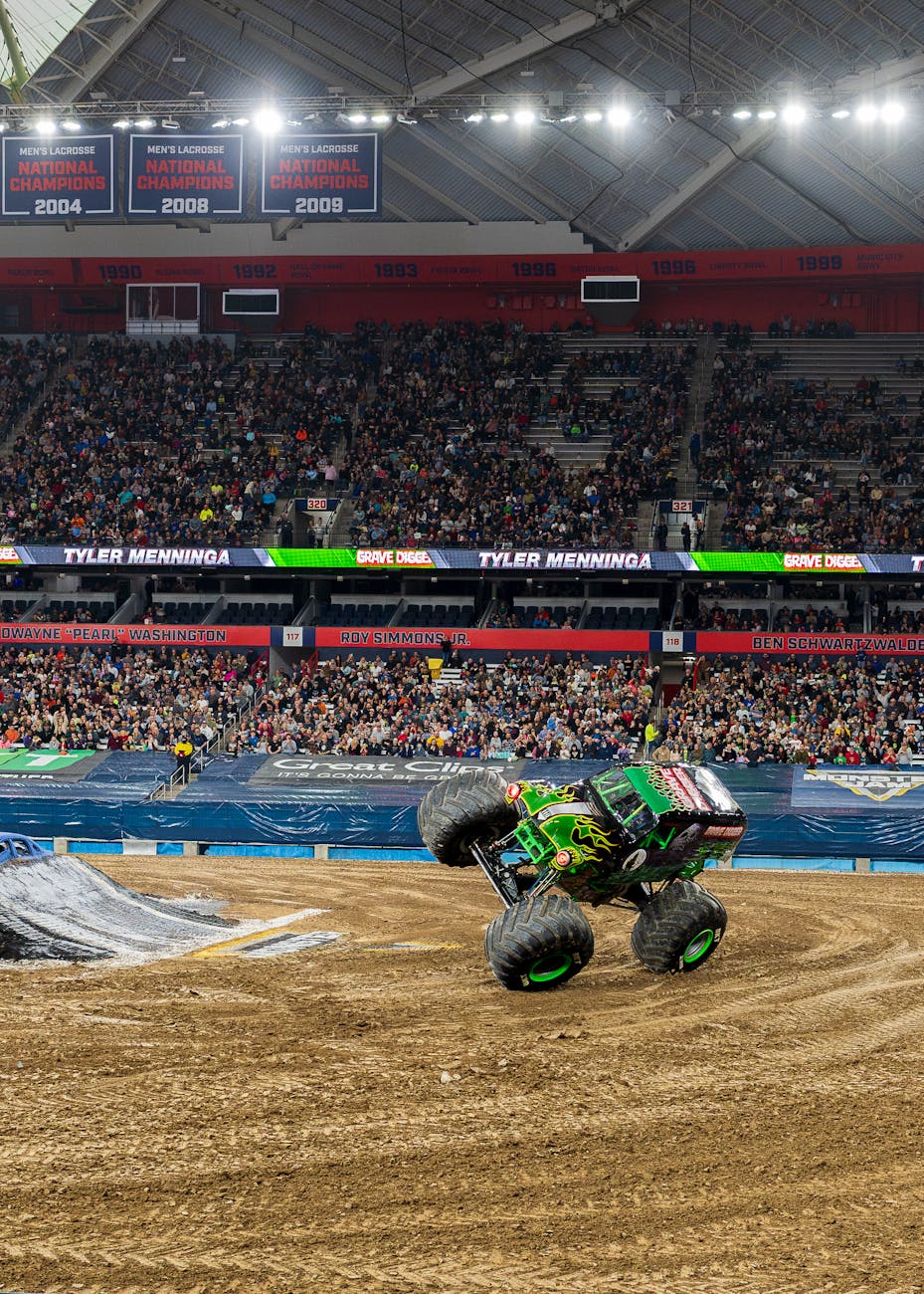 exciting monster truck event with crowd