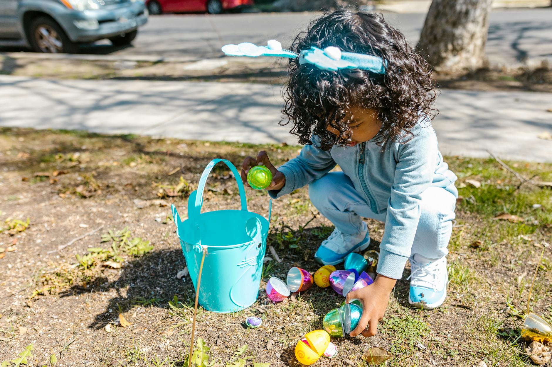 a girl holding easter eggs